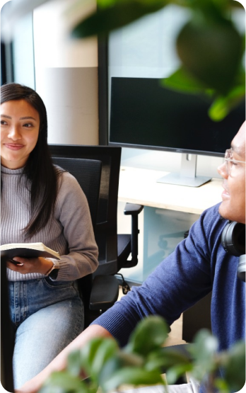 man and woman in office